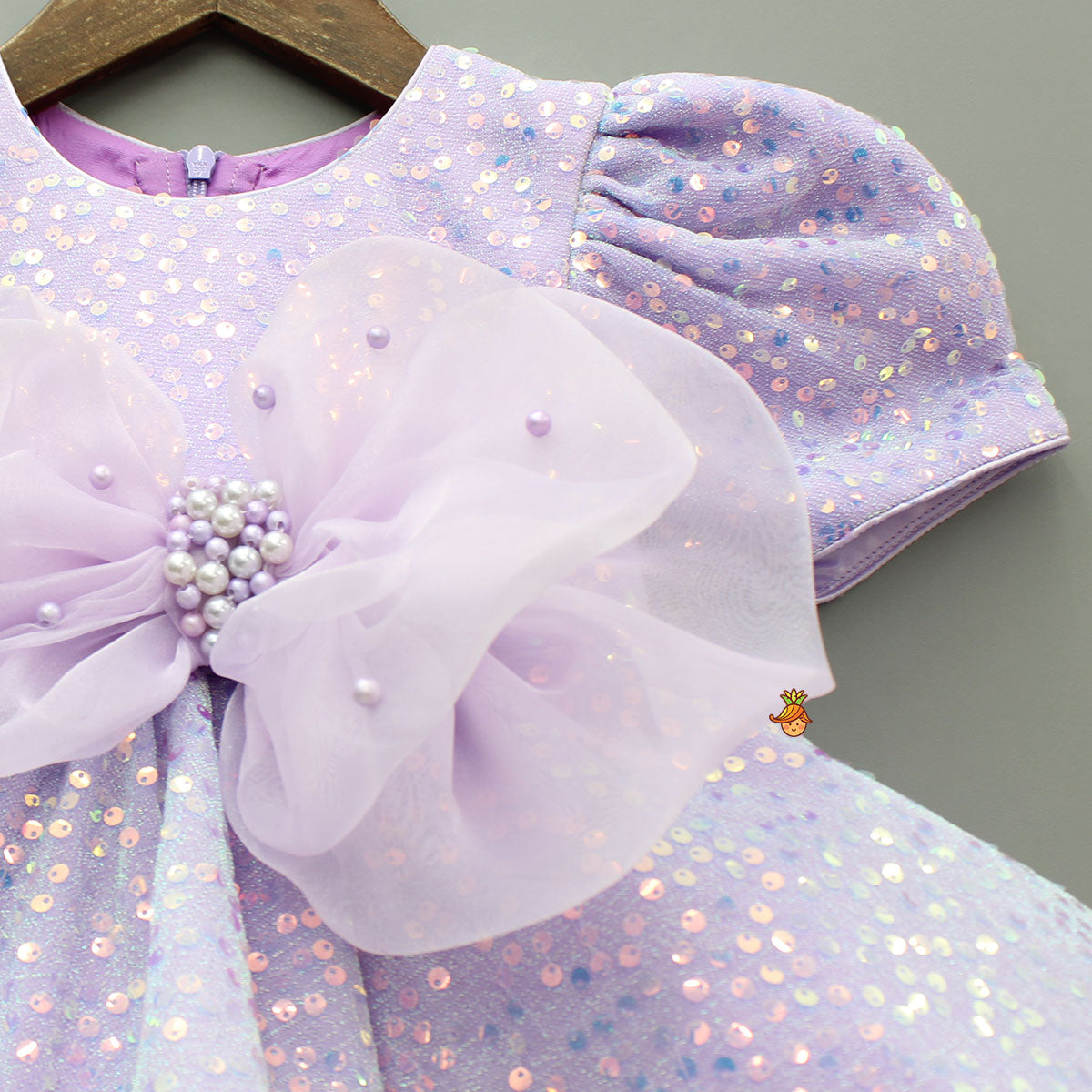 Purple Sequin Dress Adorned With Matching Bows
