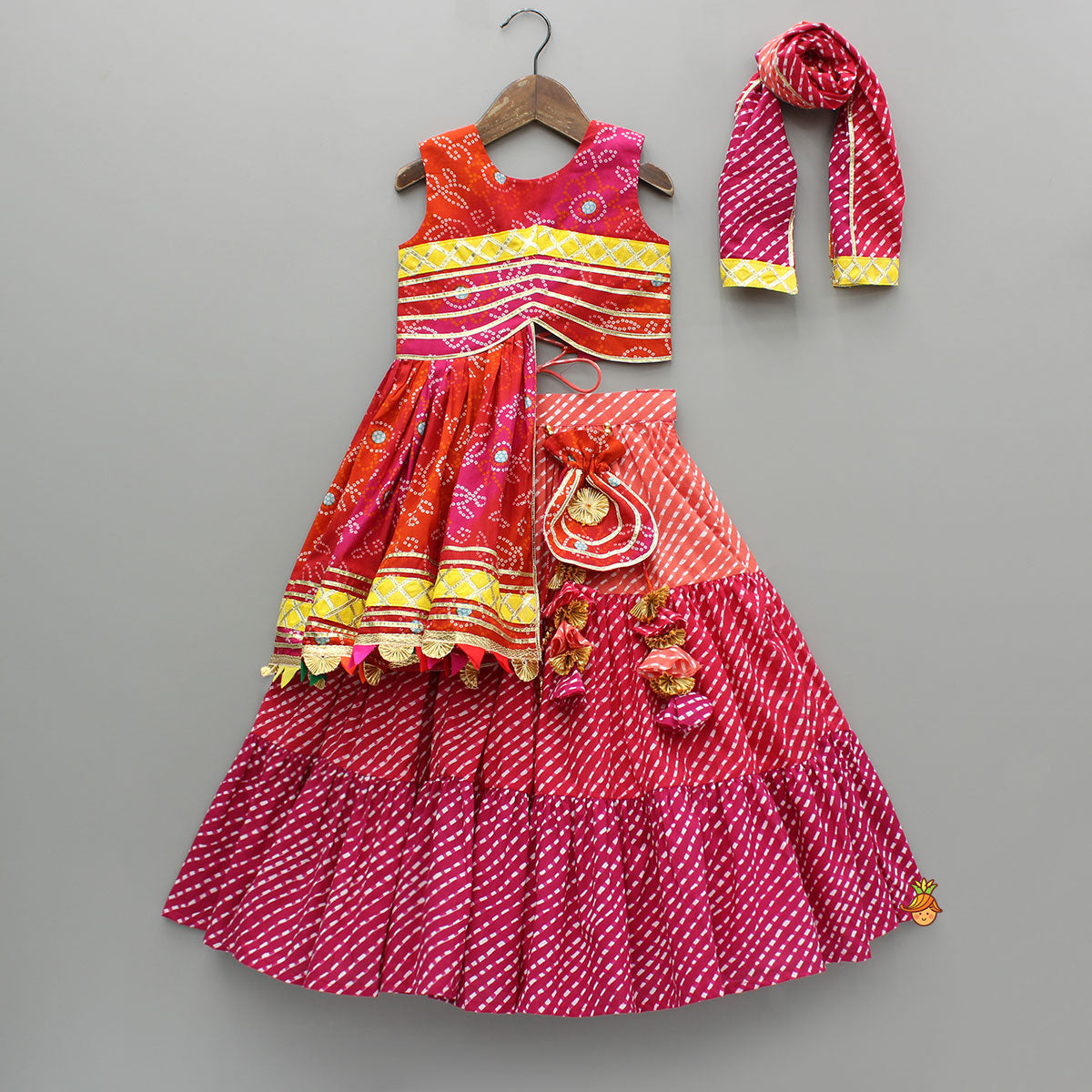 Printed Stylish Kurti And Lehenga With Attached Matching Potli And Dupatta