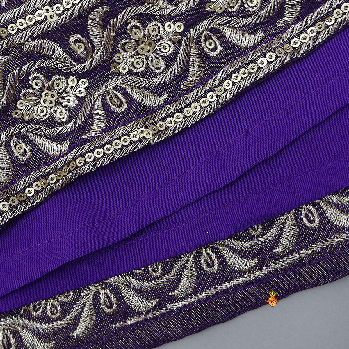 Embroidered Purple Top And Pleated Lehenga With Net Dupatta
