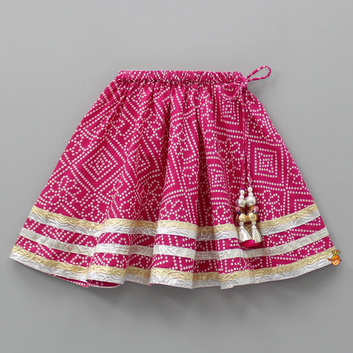 Bandhani Printed Top With Lehenga And Matching Booties With Head Band