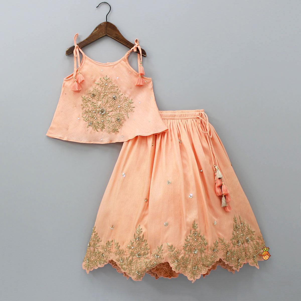 Embroidered Peach Tie-Up Strap Top And Pleated Lehenga