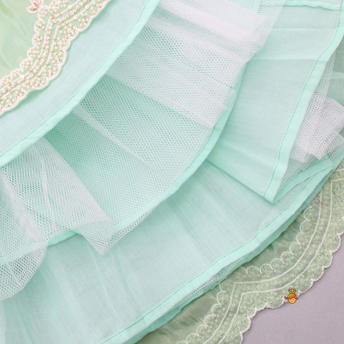 Embroidered Green Top And Pleated Lehenga