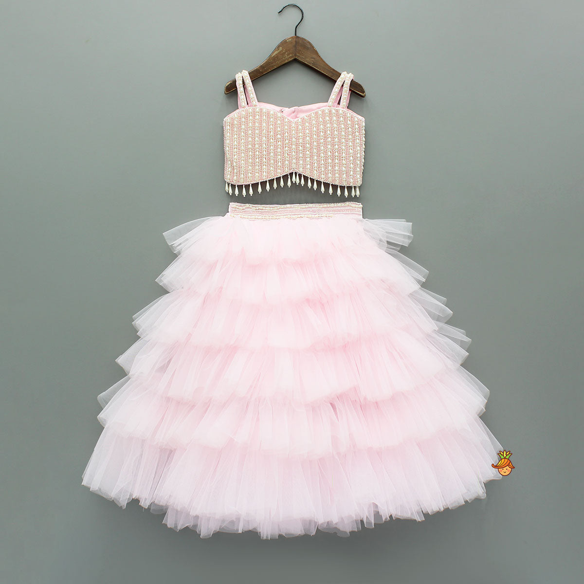 Pink Stylish Strappy Top And Ruffle Net Lehenga