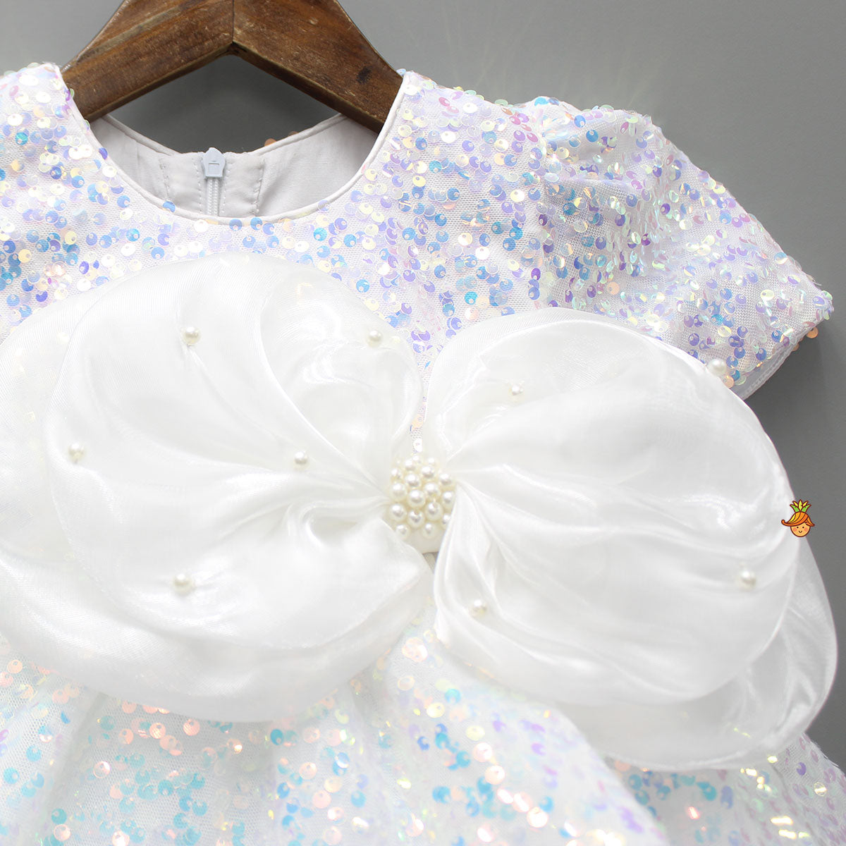 White Sequin Dress Adorned With Matching Bows