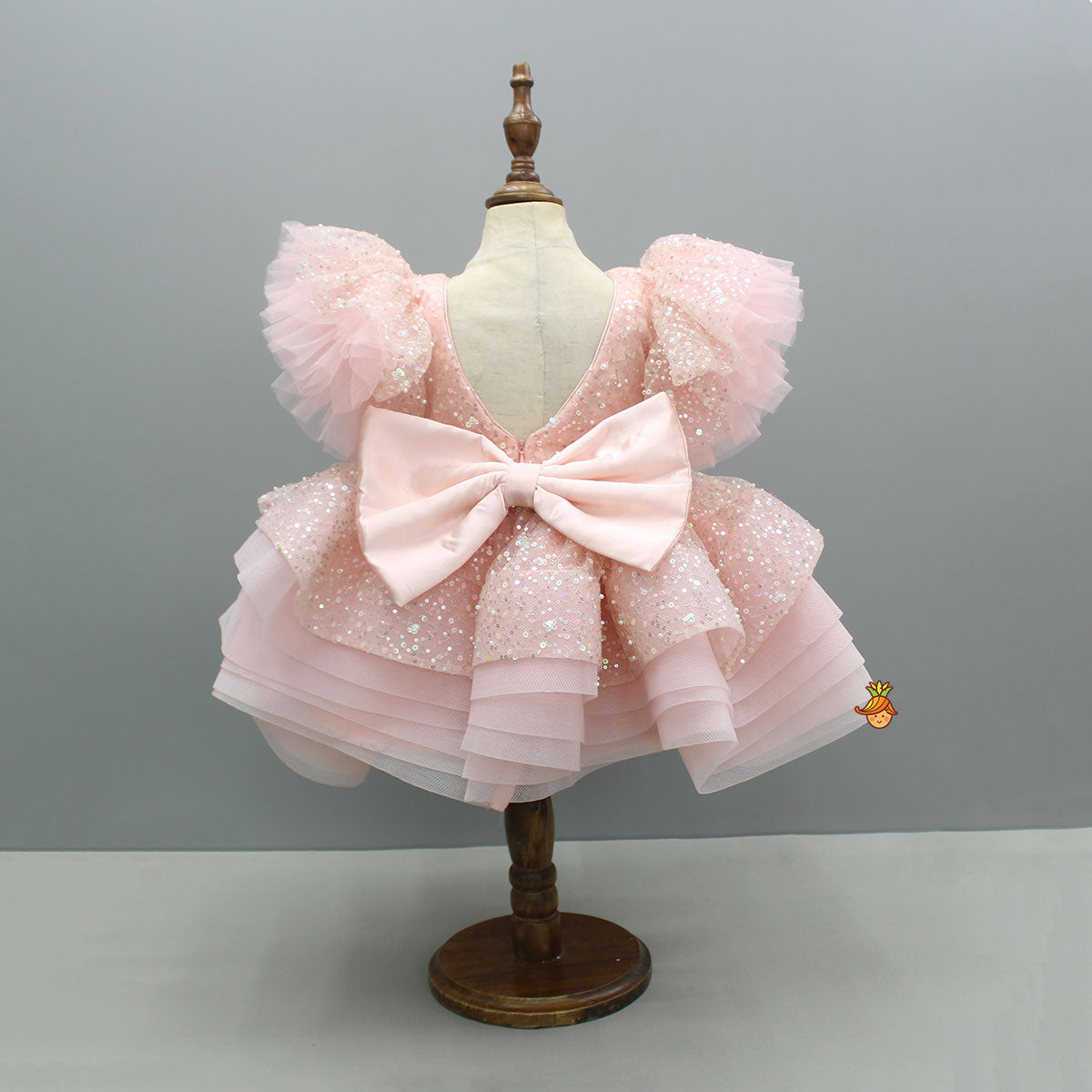 Peach Sequin Embellished Dress Featuring A Detachable Trail And Bow With Swirled Bow Headband