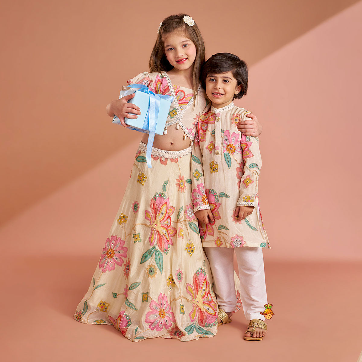 Multicolour Floral Printed And Embroidered Ivory Top With Matching Lehenga And Dupatta twinning model image 1