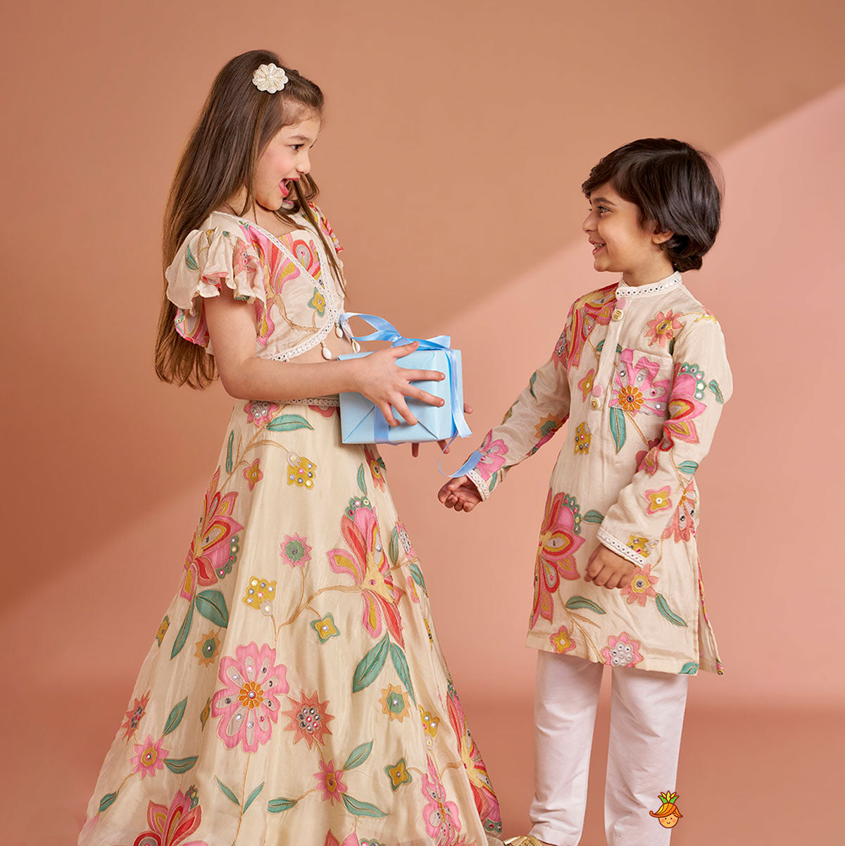 Multicolour Floral Printed And Embroidered Ivory Top With Matching Lehenga And Dupatta twinning model image 4