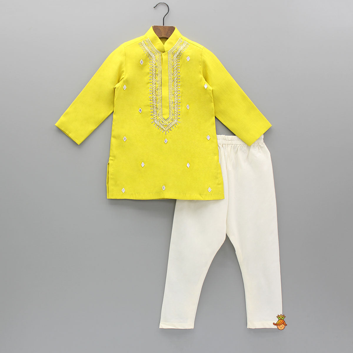 Yellow Embroidered Kurta And Churidar