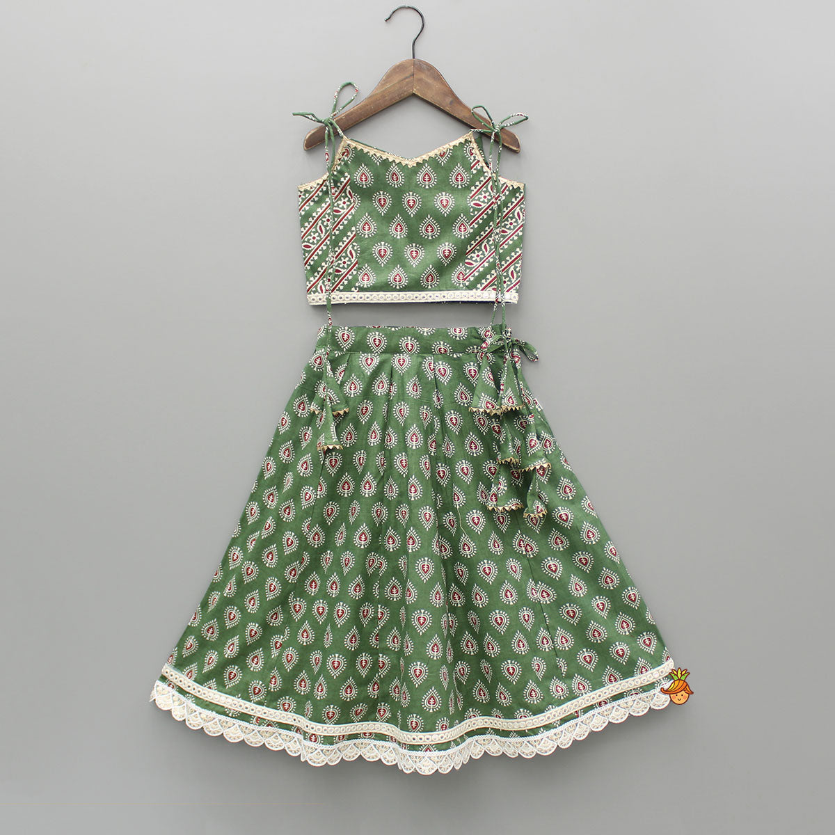 Green Printed Tie Up Strap Top And Lehenga