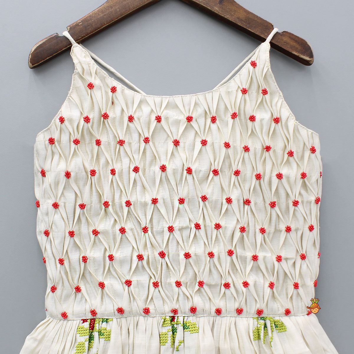 Embroidered Beige Kurti With Beads And Smocking Work