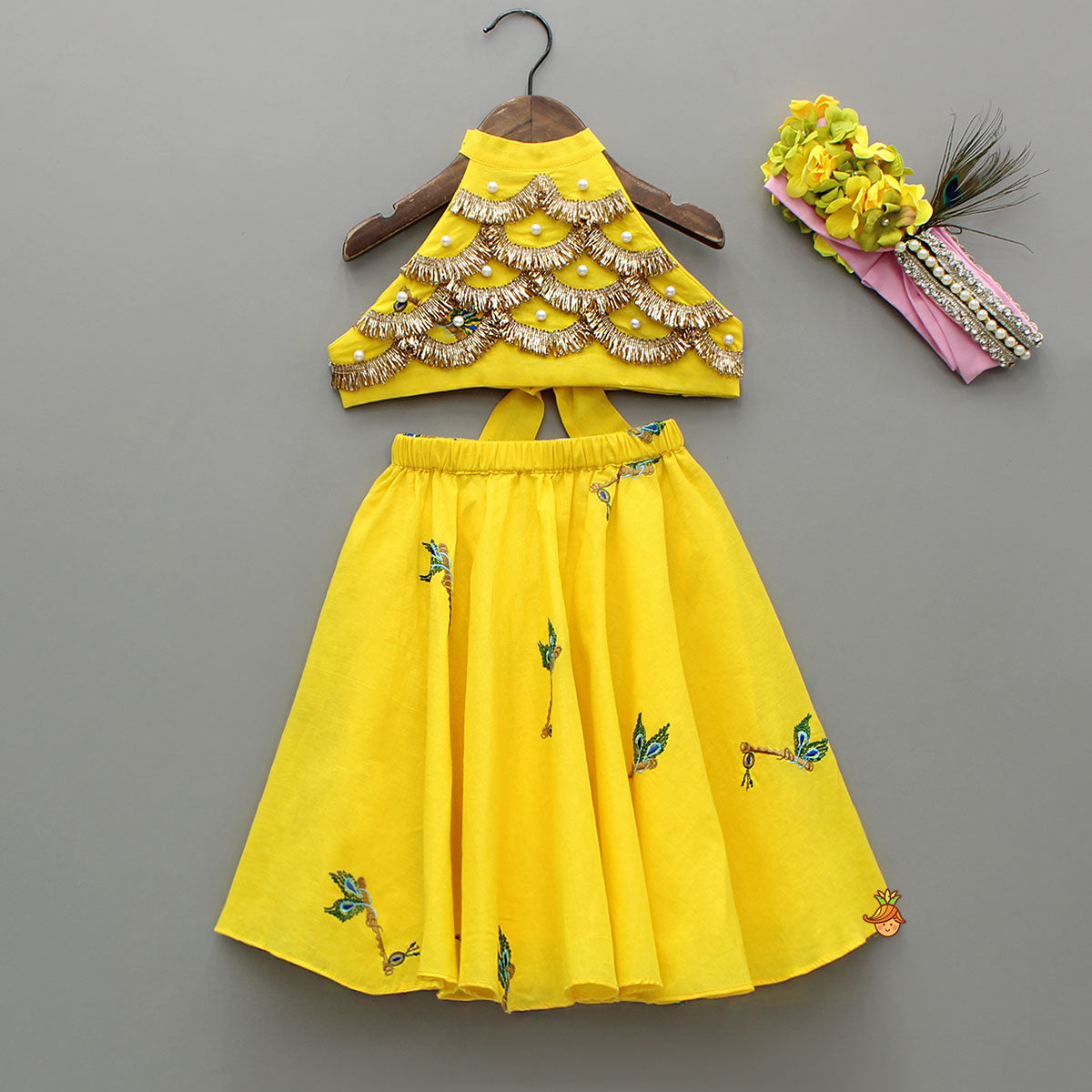 Yellow Embroidered Embellished Halter Neck Top And Lehenga With Head Band