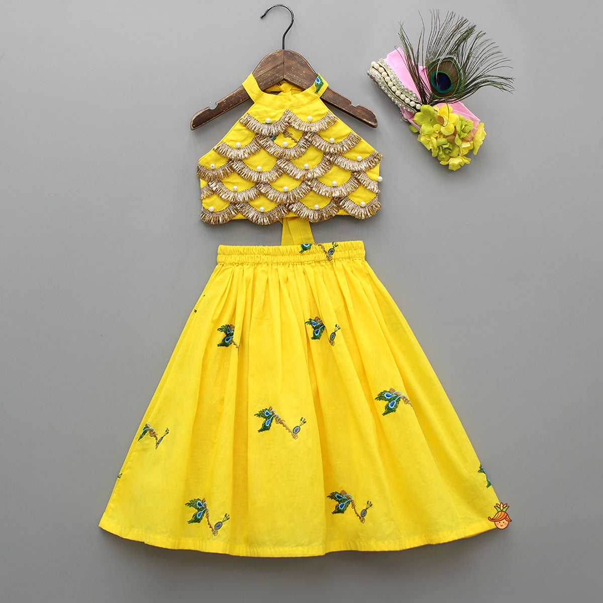 Yellow Embroidered Embellished Halter Neck Top And Lehenga With Head Band