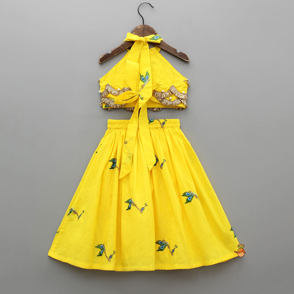 Yellow Embroidered Embellished Halter Neck Top And Lehenga With Head Band