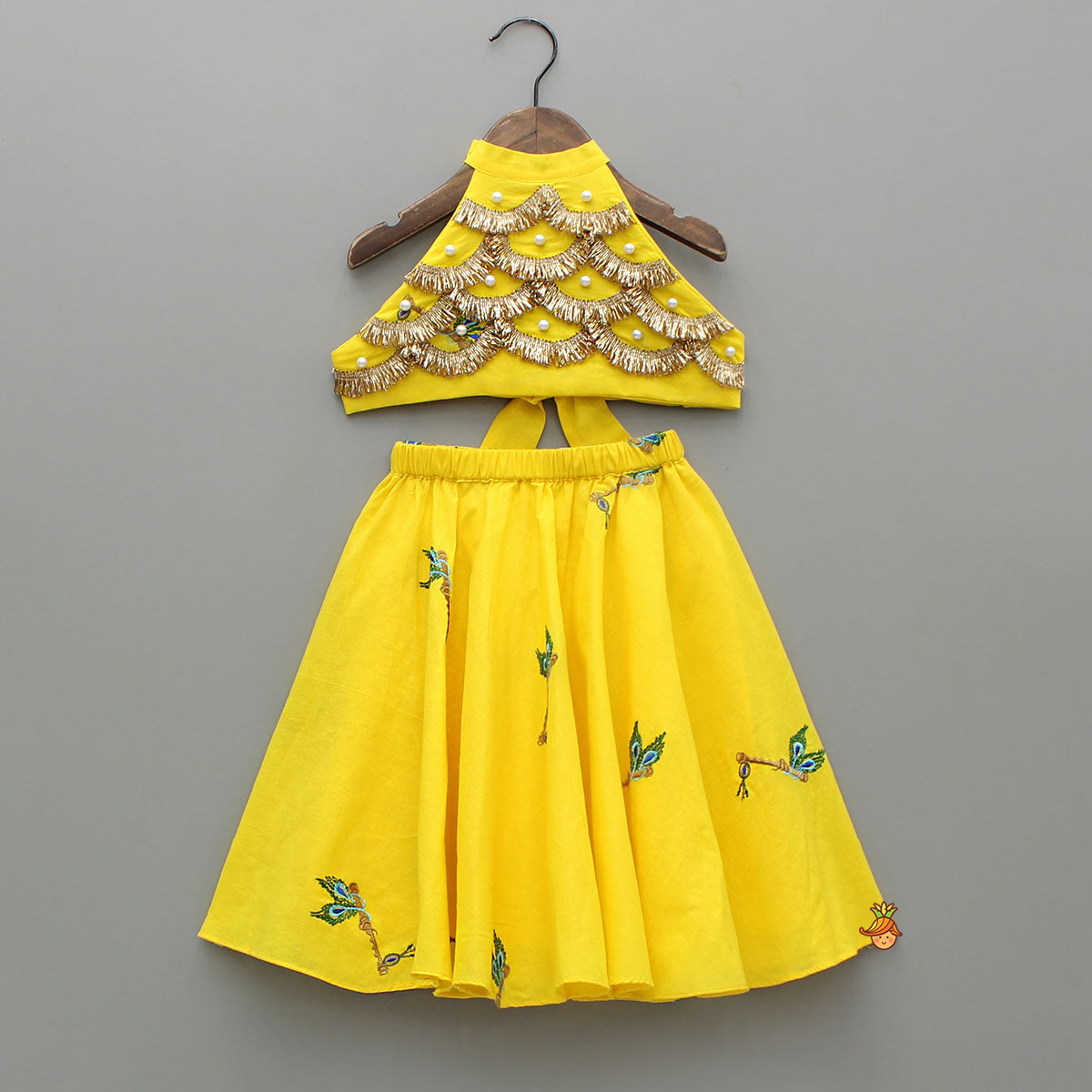 Yellow Embroidered Embellished Halter Neck Top And Lehenga With Head Band