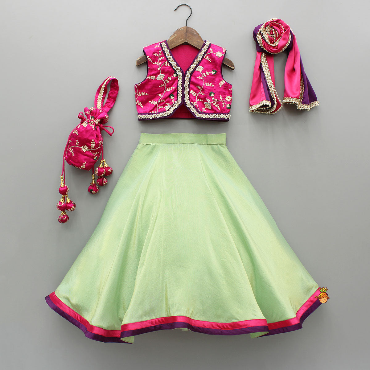 Pink Embroidered Top And Green Lehenga With Dupatta  And Matching Potli Bag