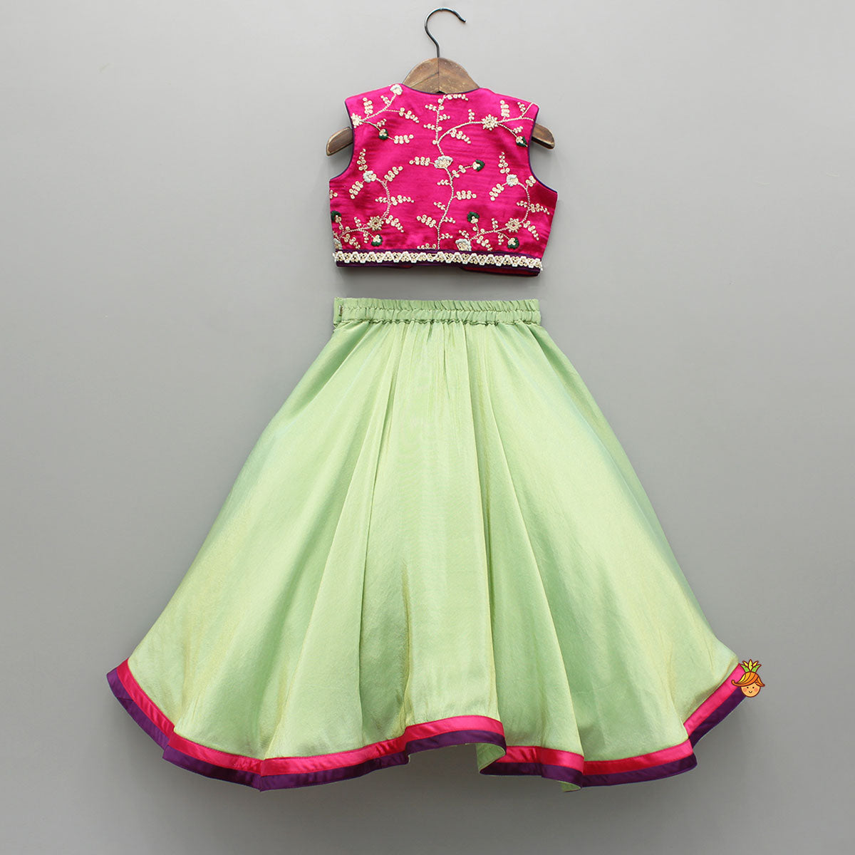 Pink Embroidered Top And Green Lehenga With Dupatta  And Matching Potli Bag