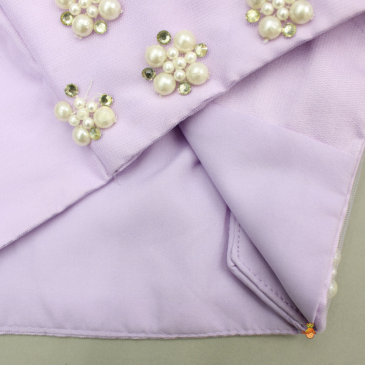 Lilac Strappy Top With Embellished Jacket And Lehenga With Matching Pouch