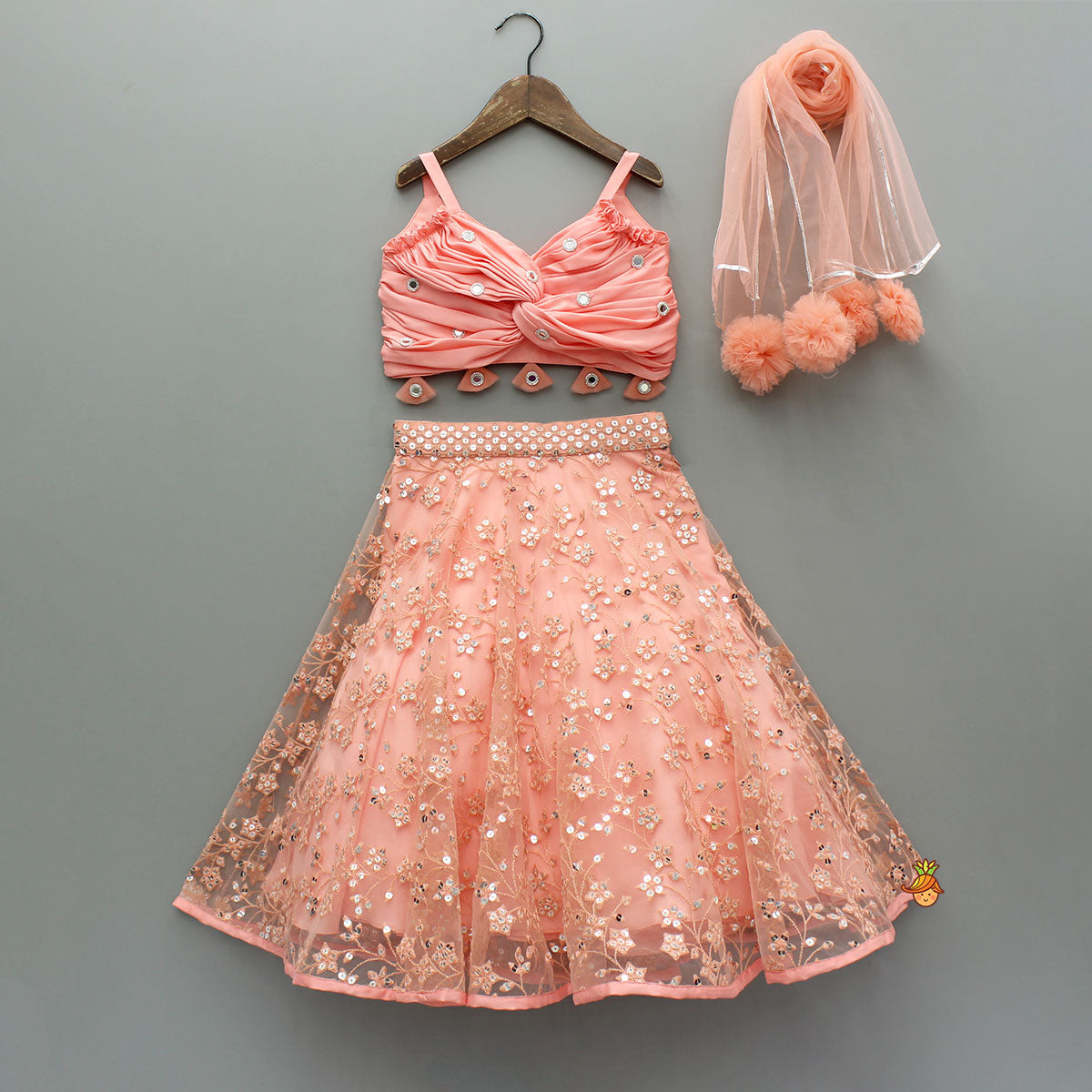 Peach Draped Knot Mirror Detailed Top With Embroidered Flared Lehenga And Dupatta