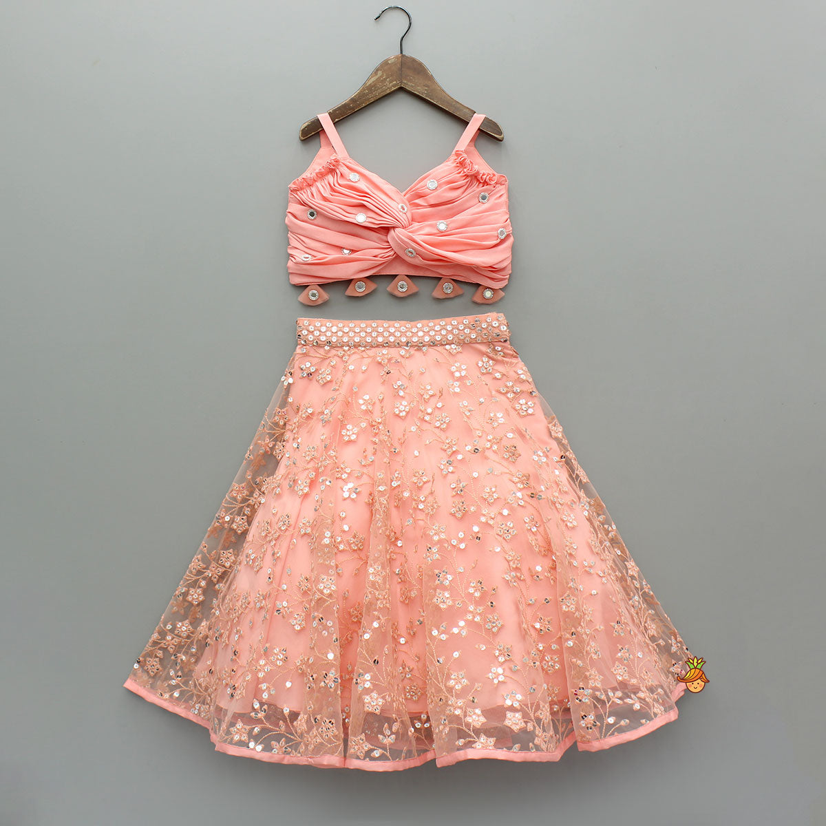 Peach Draped Knot Mirror Detailed Top With Embroidered Flared Lehenga And Dupatta
