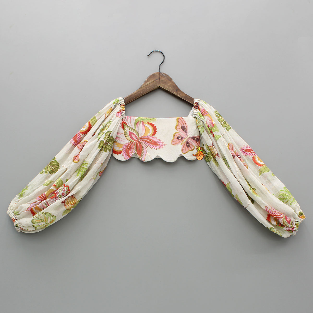 Beige Printed Embroidered Top And Umbrella Style Flared Lehenga With Matching Hairclip
