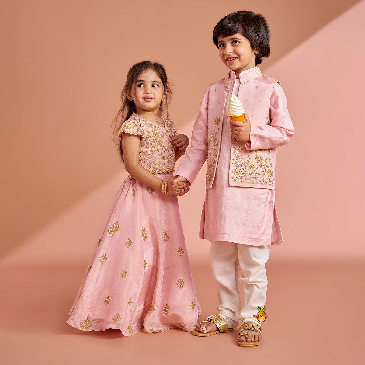 Pink Shimmery Sequin Embroidered Top With Flared Lehenga And Matching Dupatta twinning model image 1