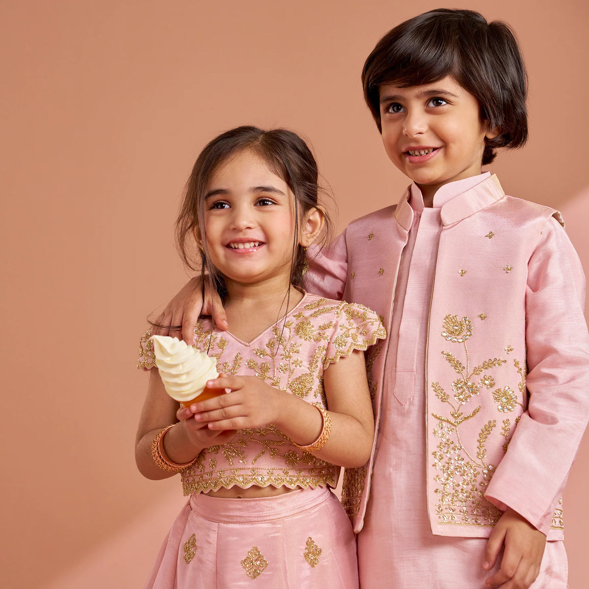 Pink Shimmery Sequin Embroidered Top With Flared Lehenga And Matching Dupatta twinning model image 3