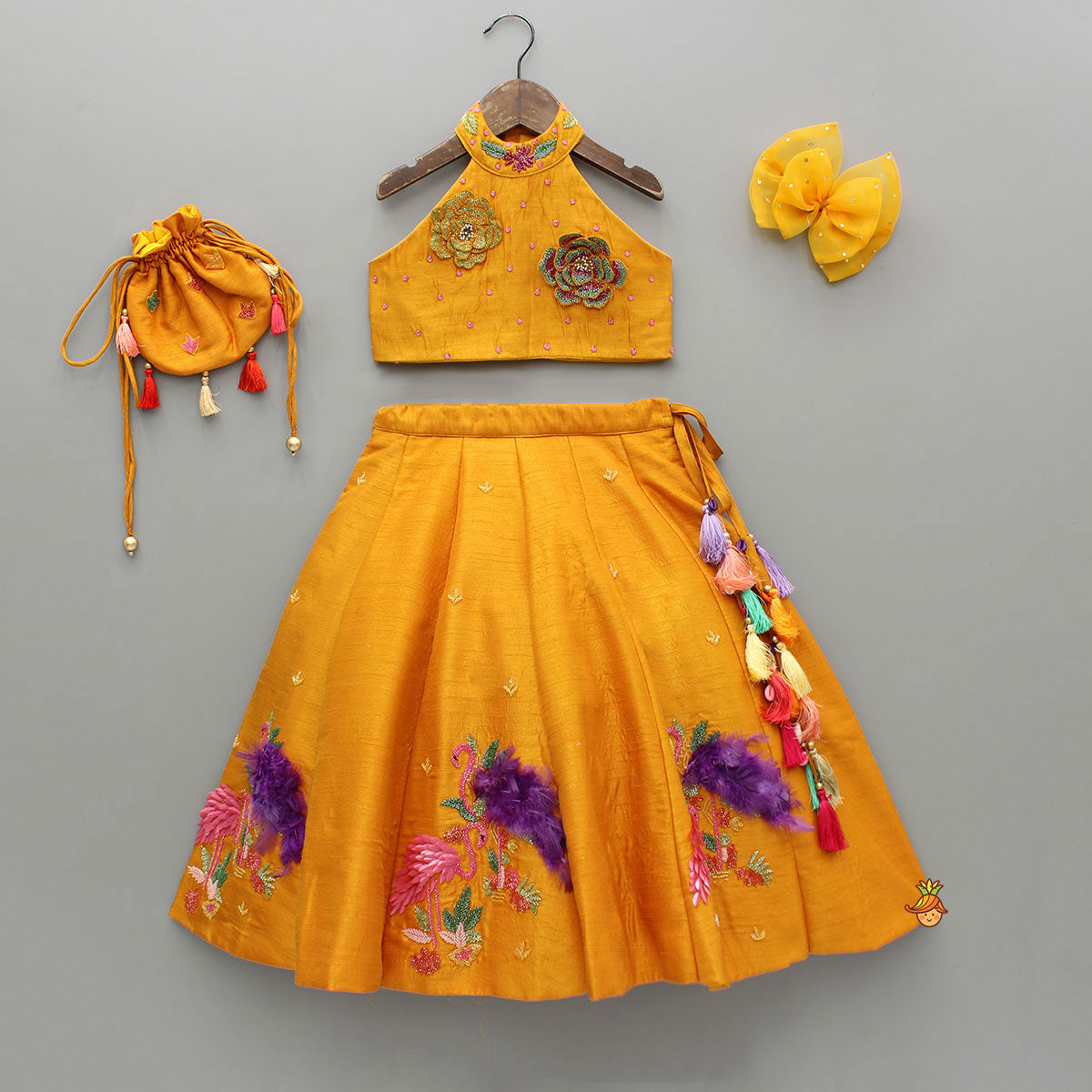 Floral Embroidered Halter Neck Top With Flared Lehenga And Bow Hair Clip With Potli Bag