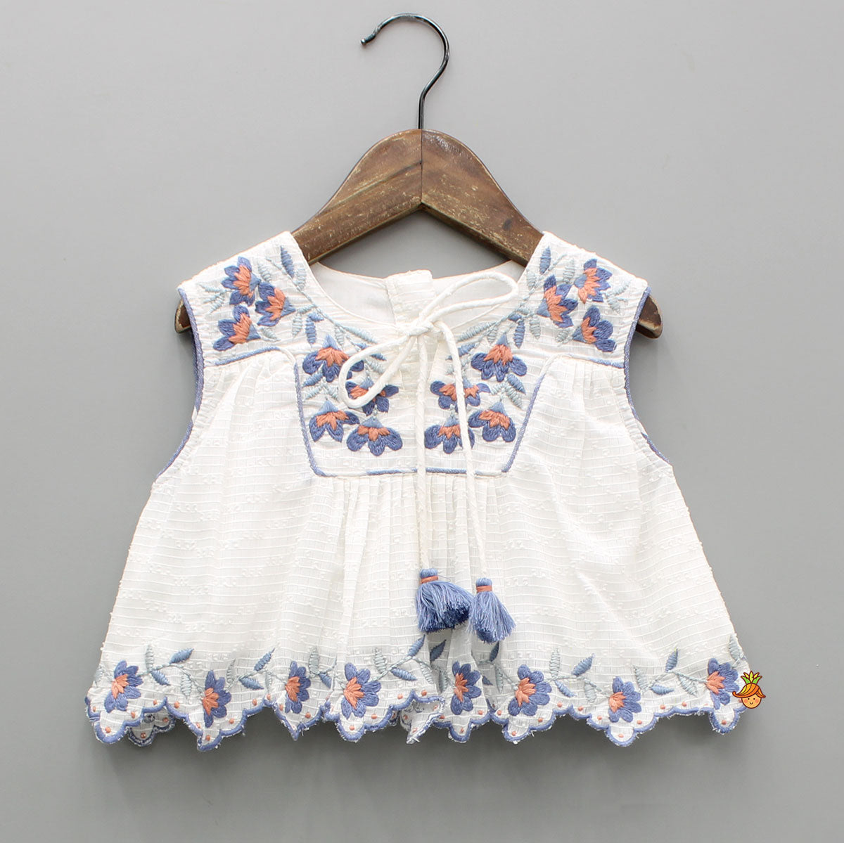 Cotton Top With Knot-Detailed Neckline And Ikat Printed Lehenga