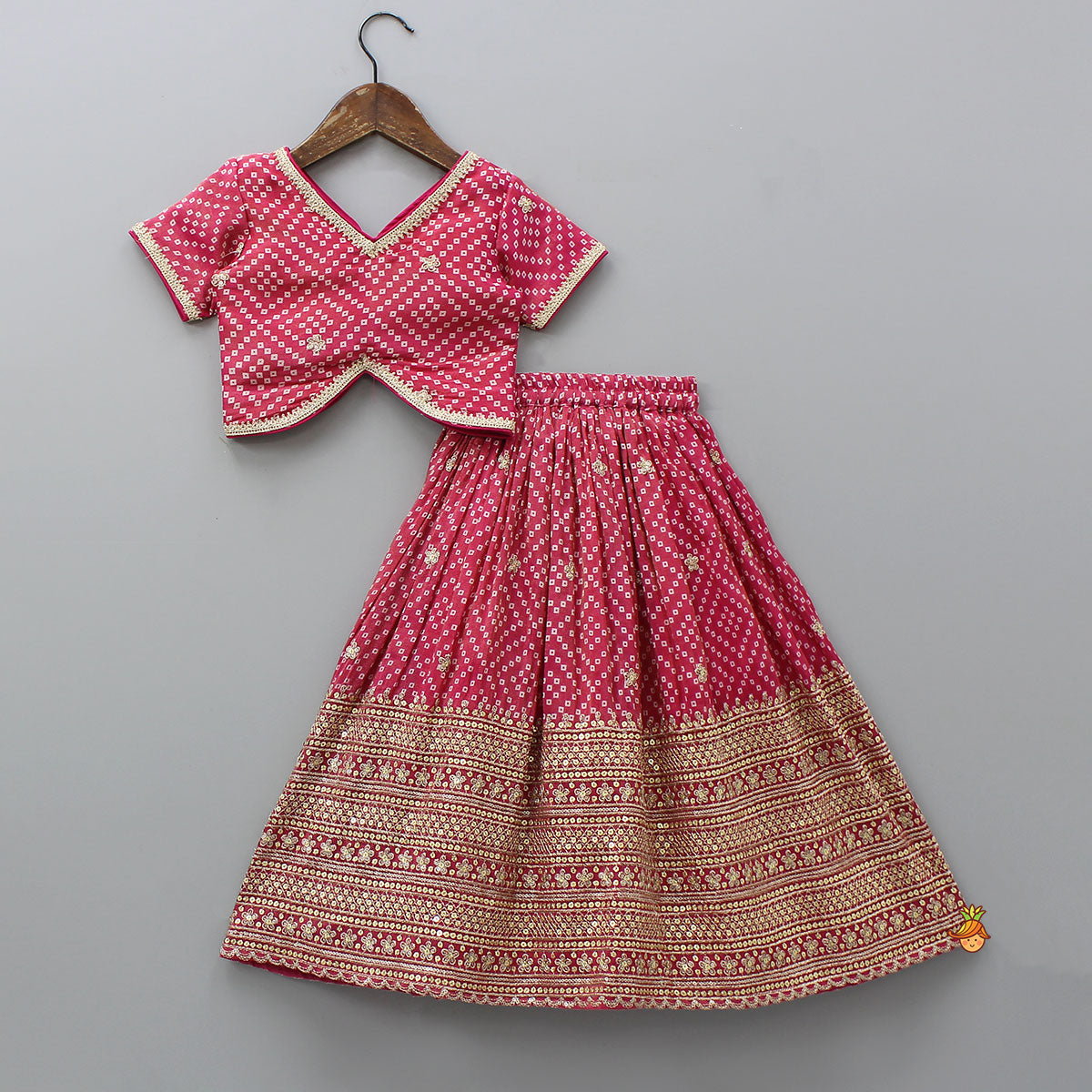 V-Neck Bandhani-Printed Pink Shimmery Top And Lehenga With Sequins Embroidered Matching Dupatta
