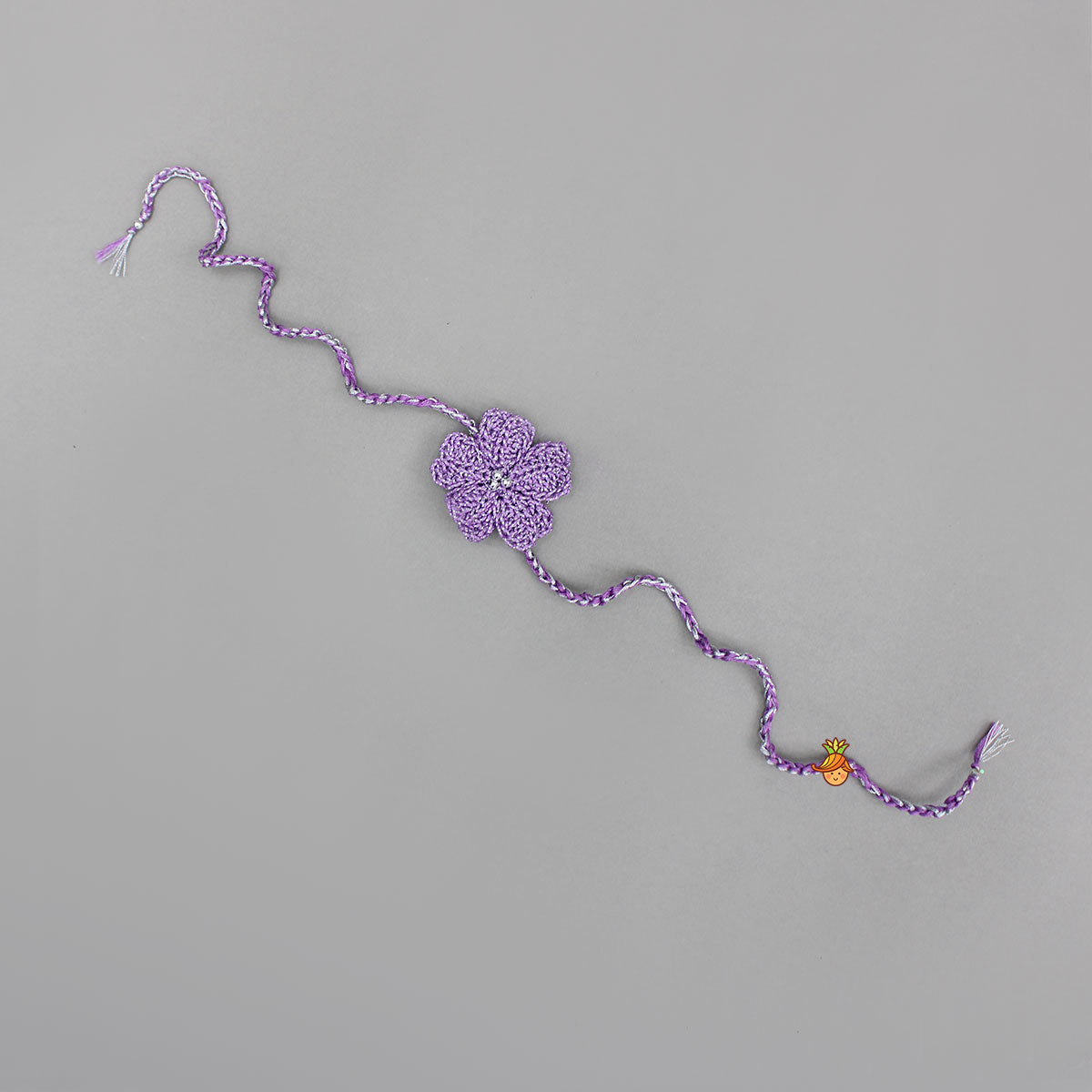 Purple Azure Bloom Crochet Rakhi