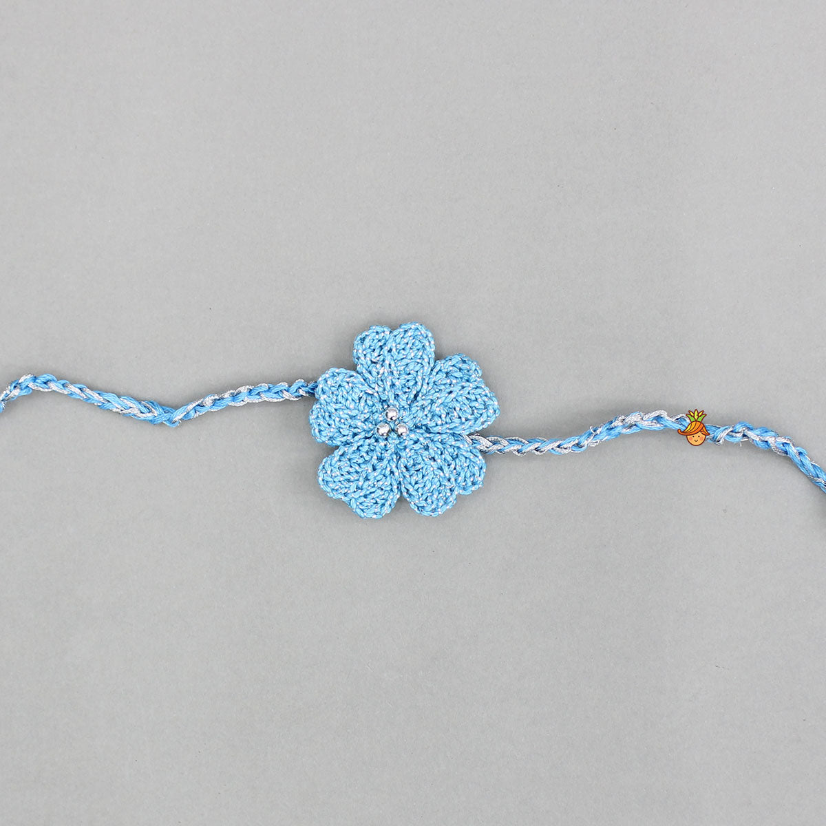 Blue Azure Bloom Crochet Rakhi