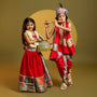 Festive Red Dhoti With Printed Shawl And Mor Pankh-Embellished Headband twinning model image 3