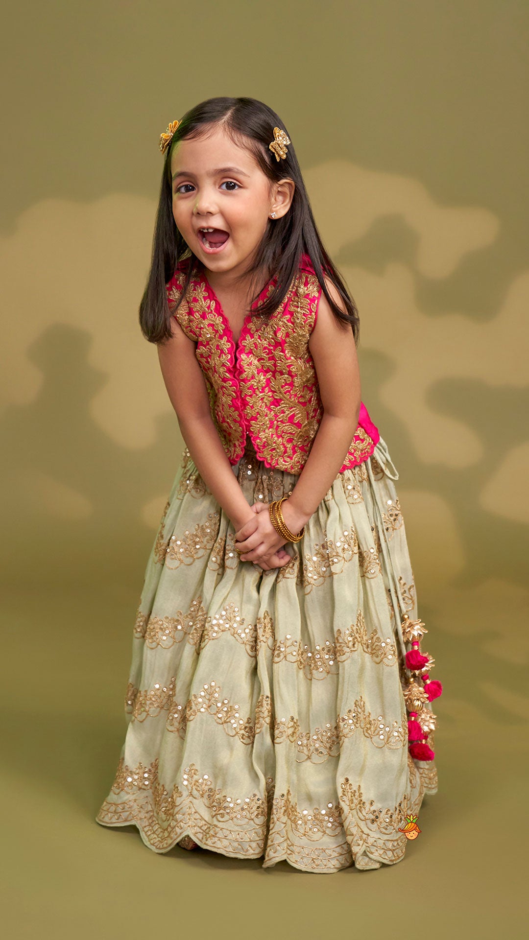 Exquisite Waistcoat Style Embroidered Top With Shimmery Lehenga And Shimmery Dupatta