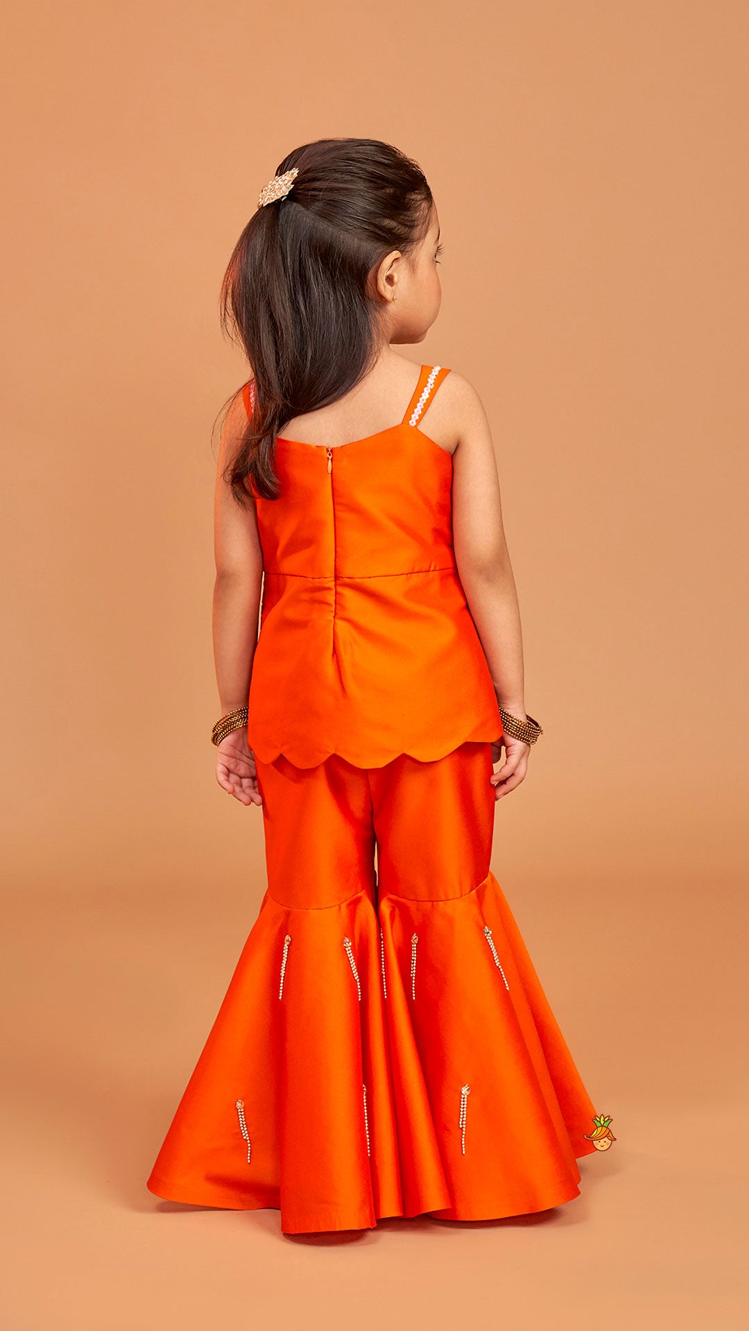 Exquisite Orange Kurti With Flared Sharara And Choker Dupatta