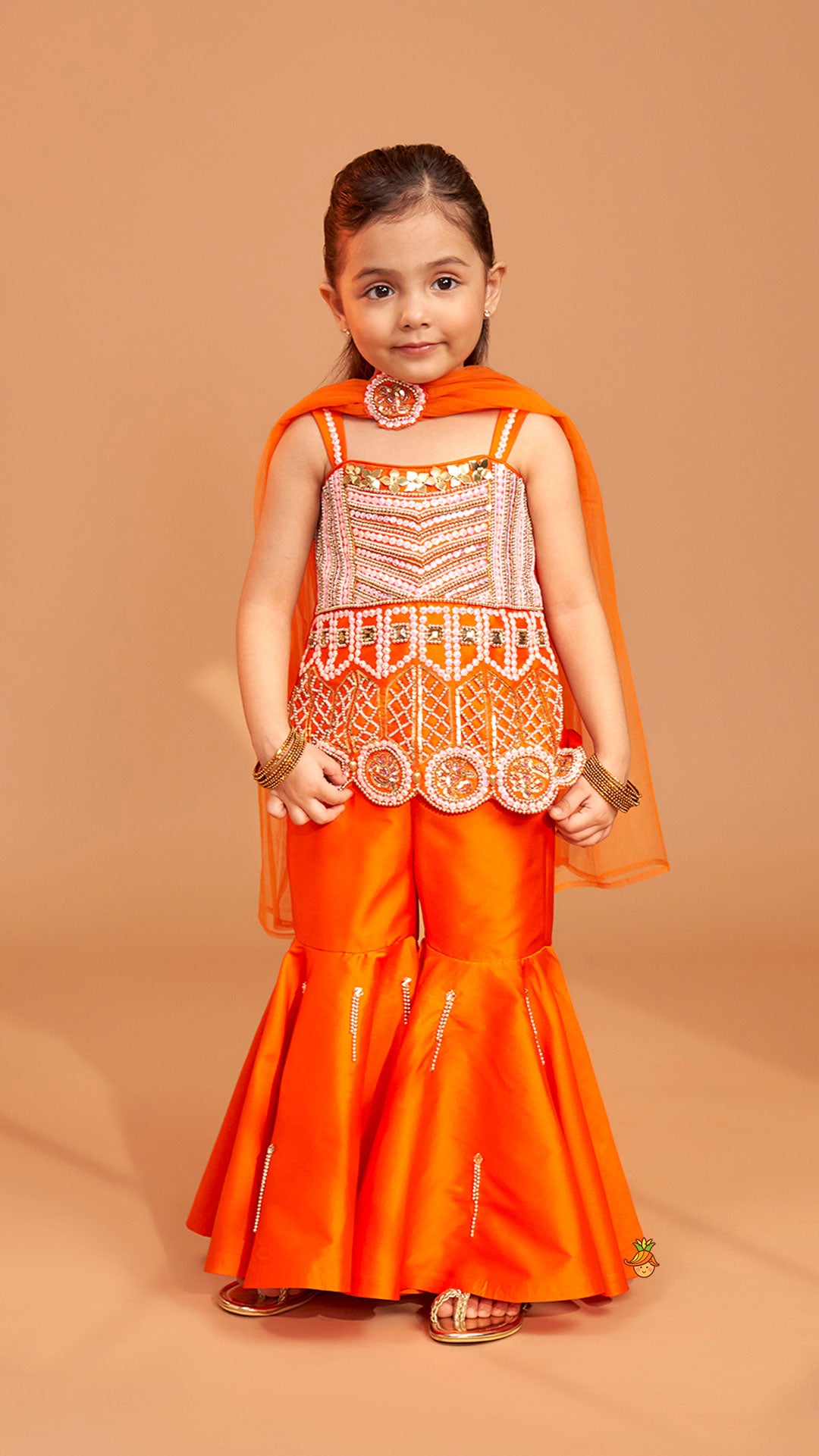 Exquisite Orange Kurti With Flared Sharara And Choker Dupatta
