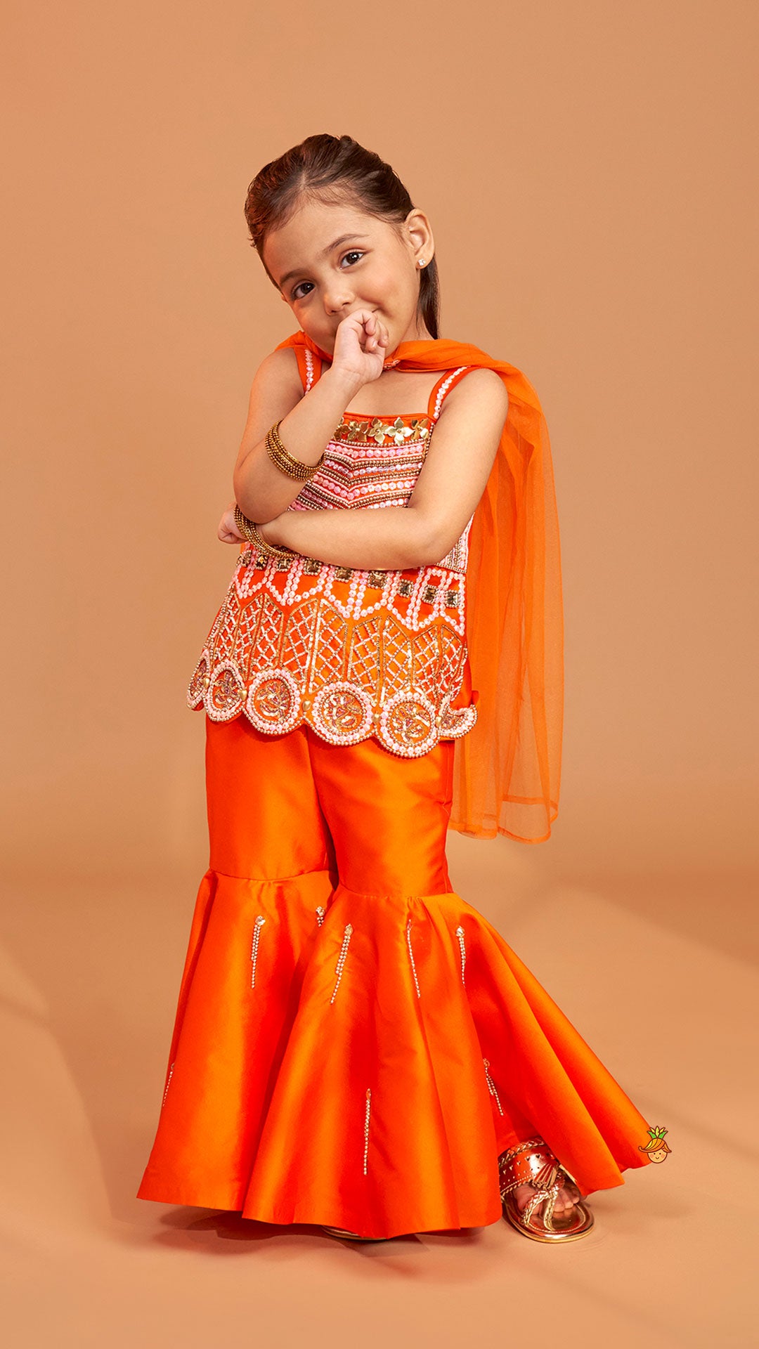 Exquisite Orange Kurti With Flared Sharara And Choker Dupatta