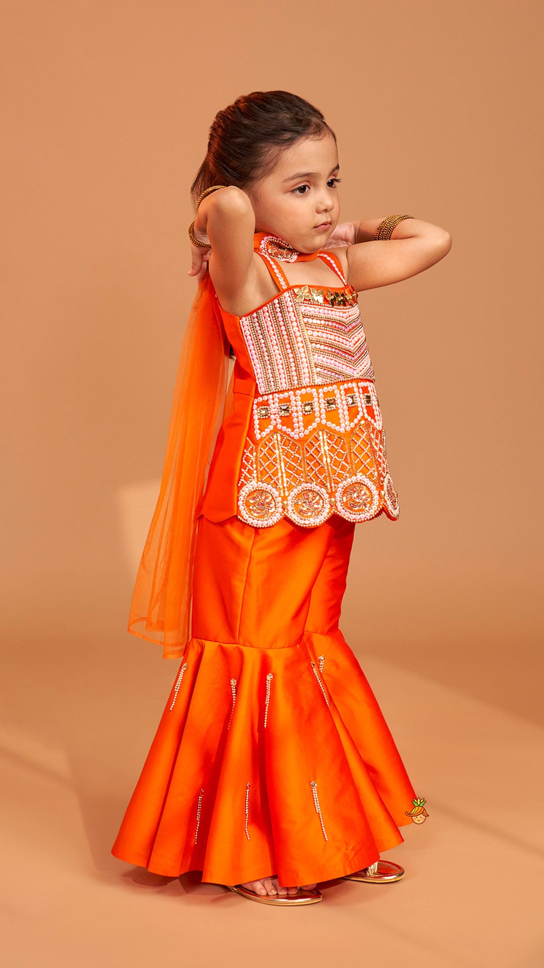 Exquisite Orange Kurti With Flared Sharara And Choker Dupatta