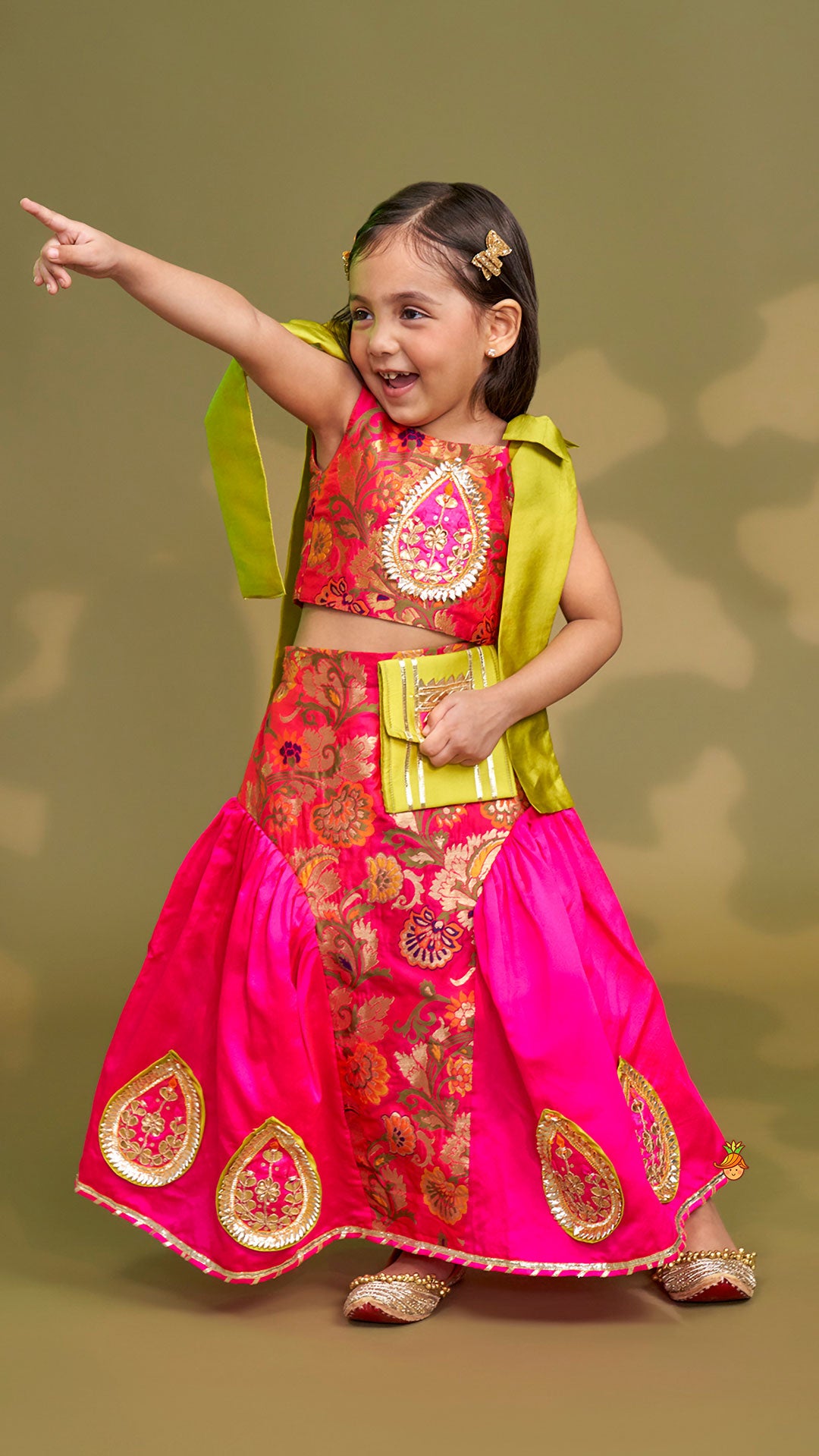 Stunning Bow Embellished Floral Top With Matching Lehenga And Attached Pouch