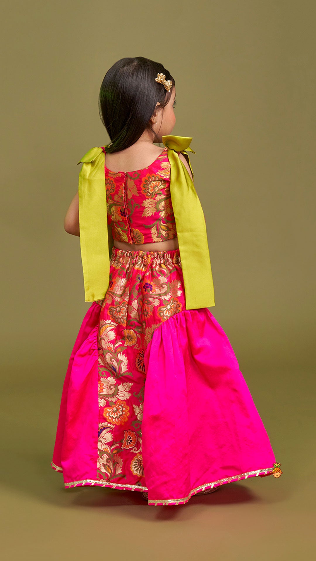 Stunning Bow Embellished Floral Top With Matching Lehenga And Attached Pouch