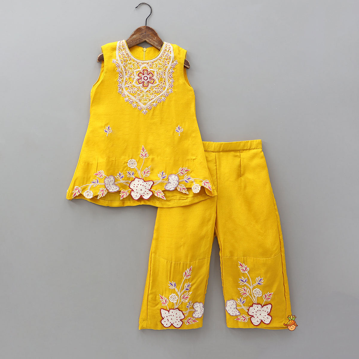 Beautiful Floral Embroidered Sleeveless Kurti With Pant