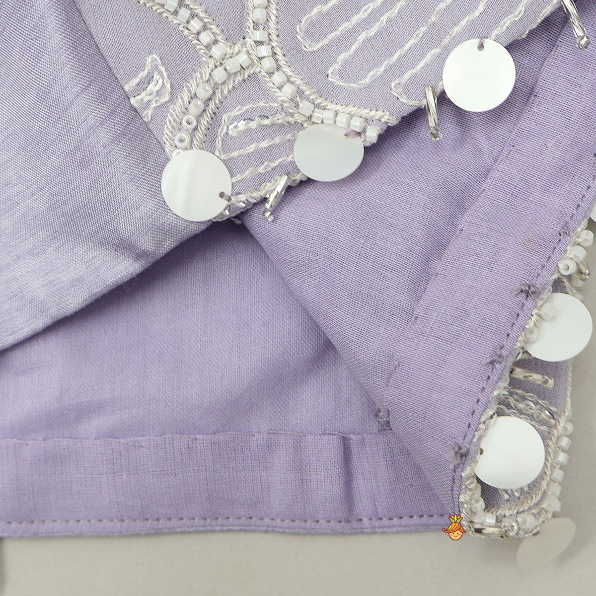 Lavender Bow Adorned Sleeveless Embroidered Top With Lehenga