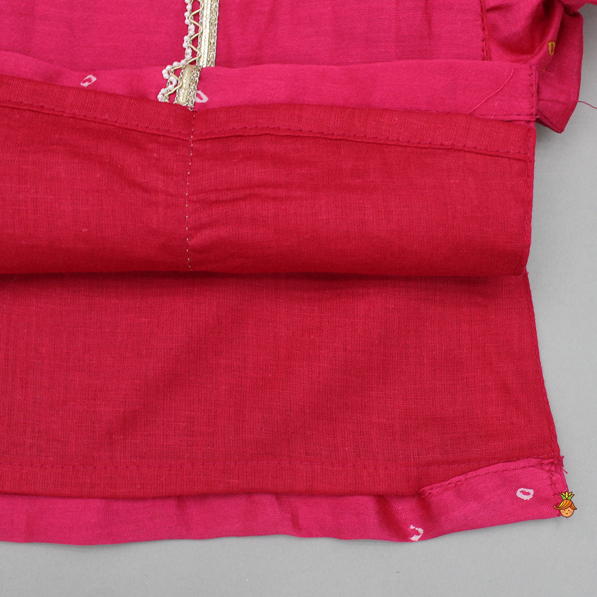 Sleeveless Bow Adorned Bandhani Printed Kurti With Matching Palazzo