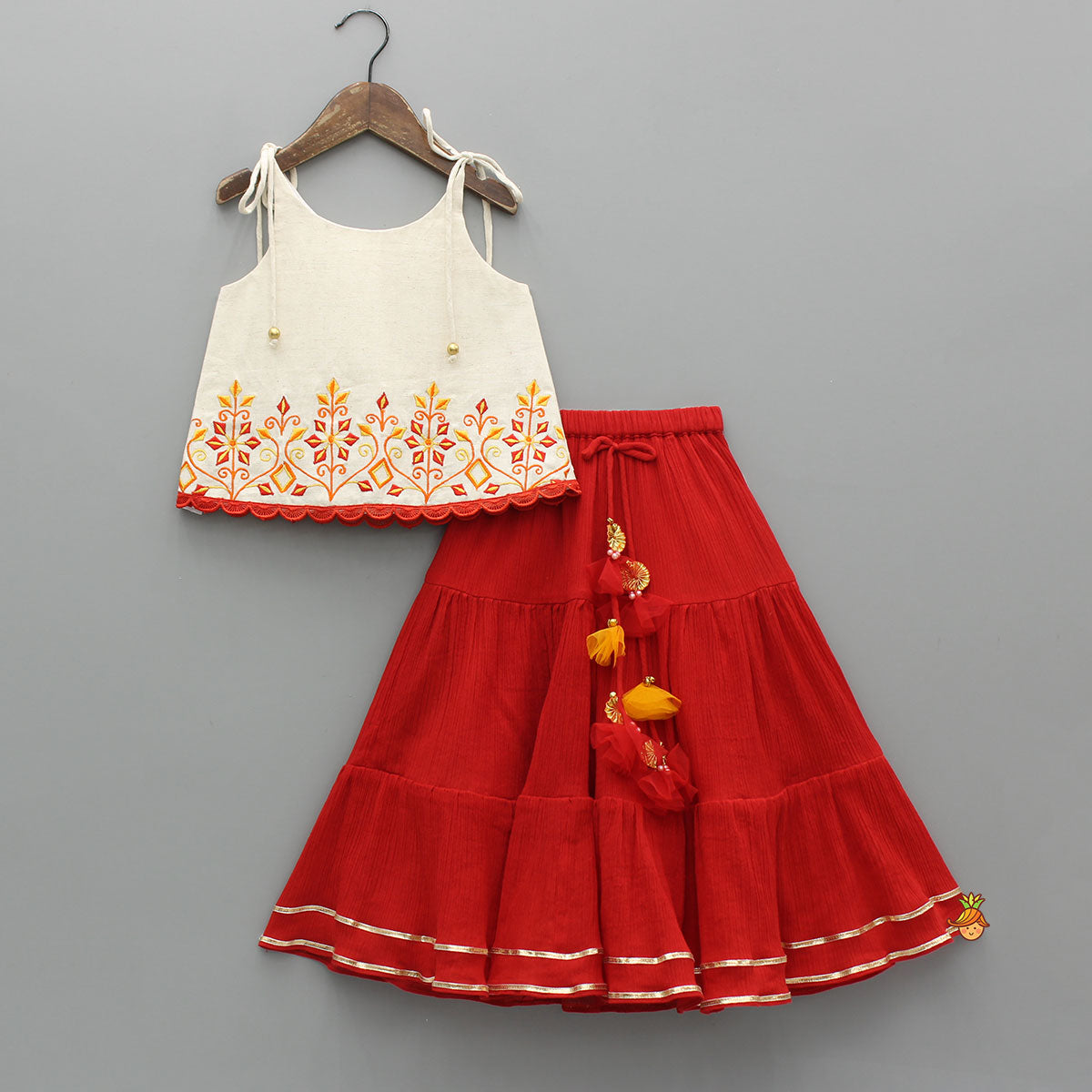 Tie Up Strappy Embroidered Top With Tiered Lehenga