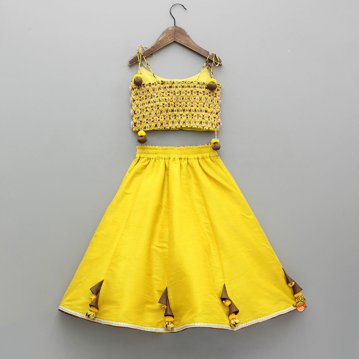 Flowers Adorned Smocked Tie Up Top With Lehenga And Waist Belt