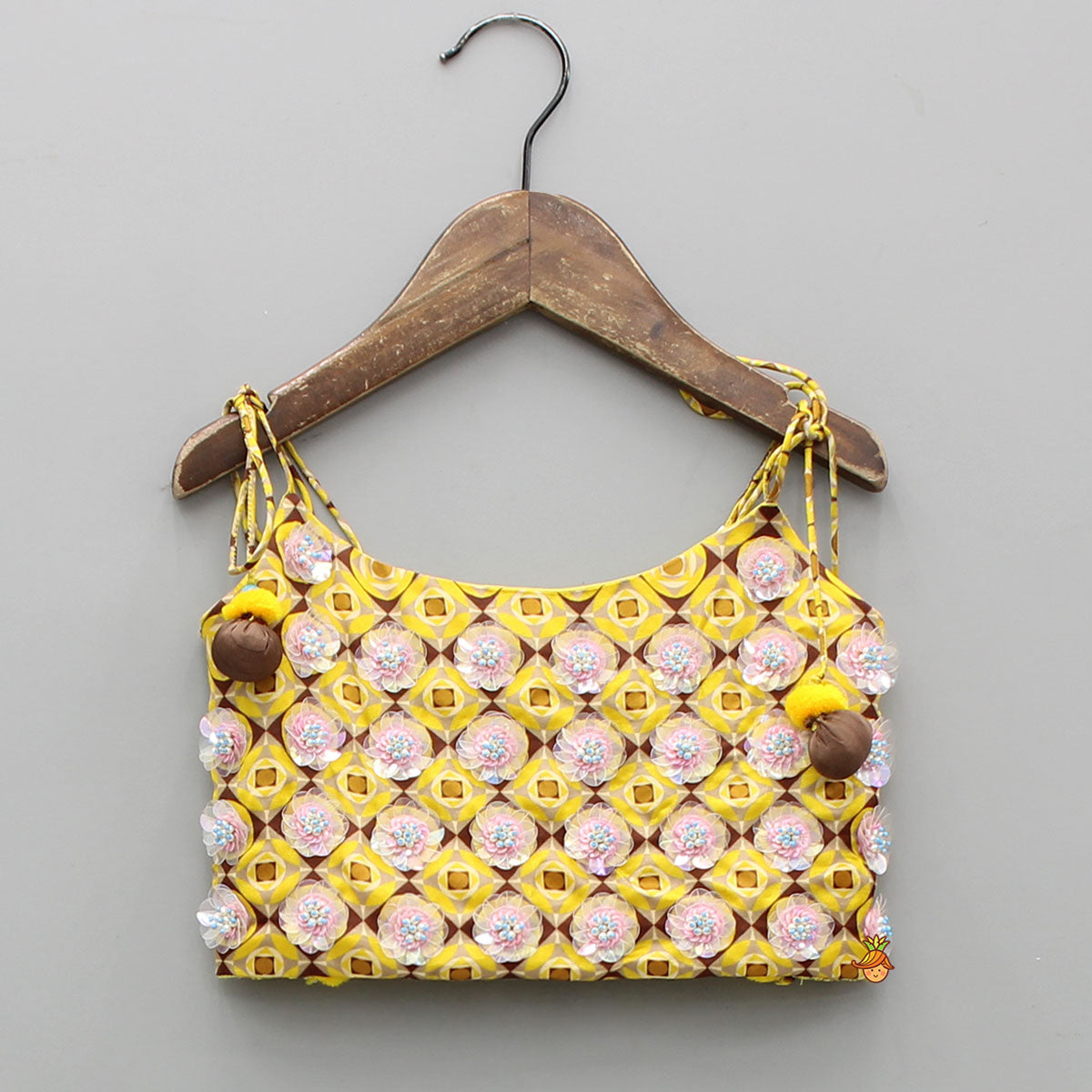 Flowers Adorned Smocked Tie Up Top With Lehenga And Waist Belt