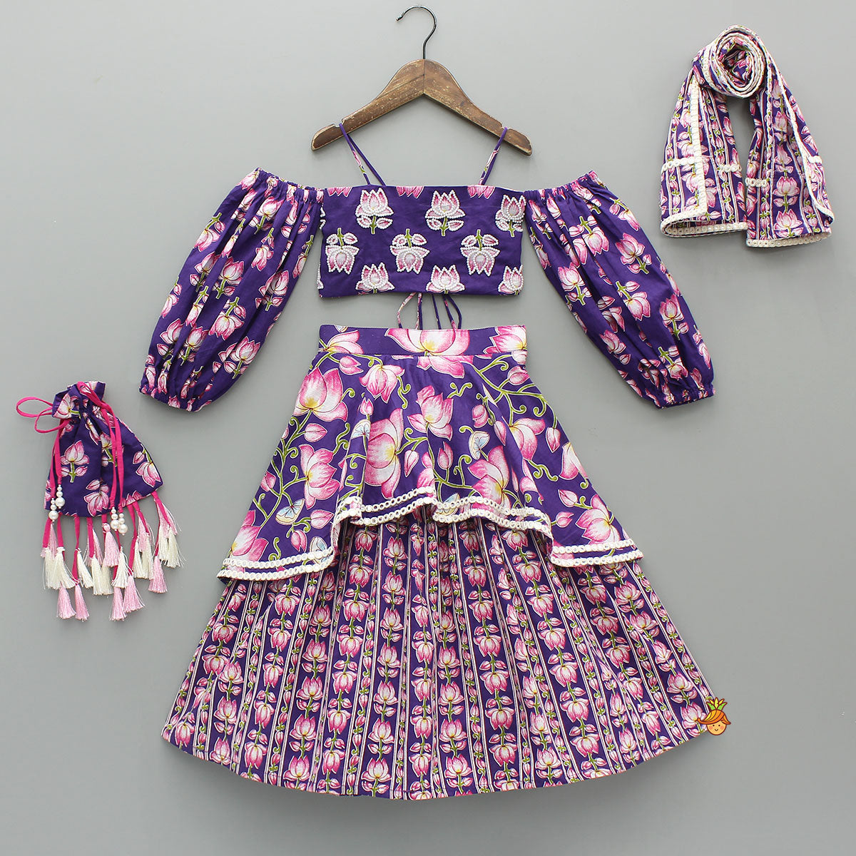 Lotus Embroidered Top And Layered Lehenga With Dupatta And Fringed Potli Bag