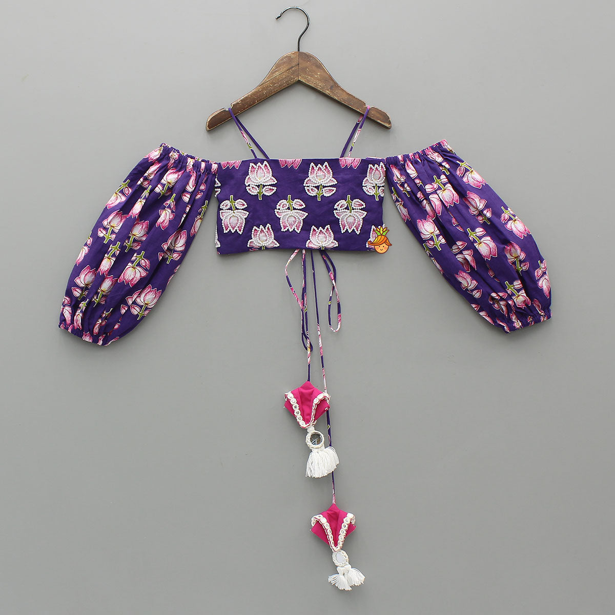 Lotus Embroidered Top And Layered Lehenga With Dupatta And Fringed Potli Bag