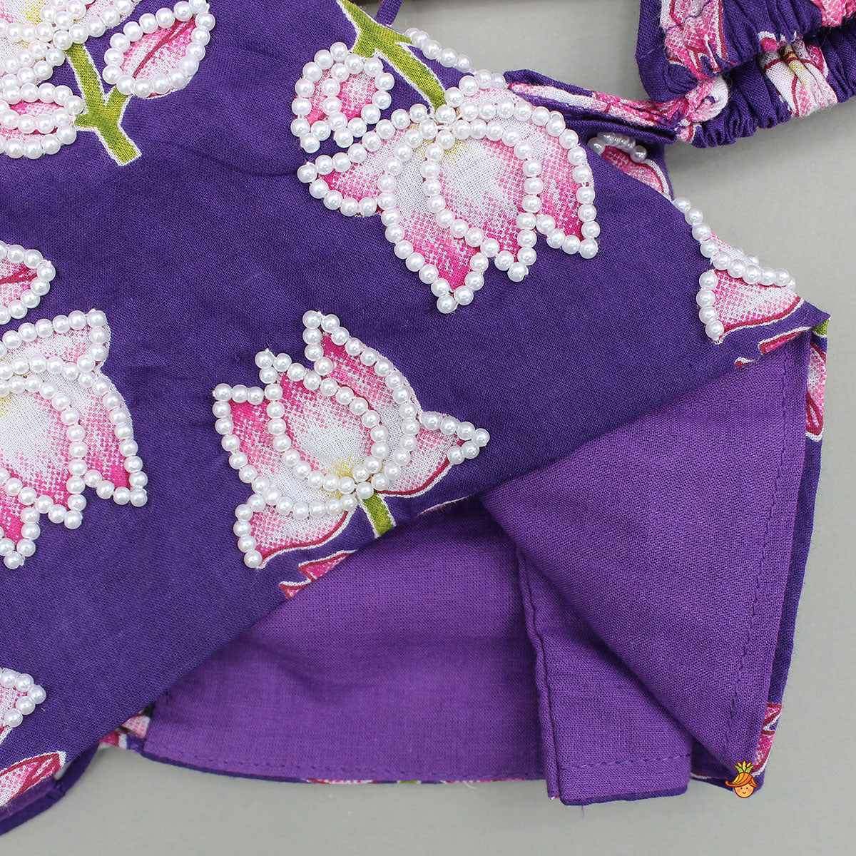 Lotus Embroidered Top And Layered Lehenga With Dupatta And Fringed Potli Bag