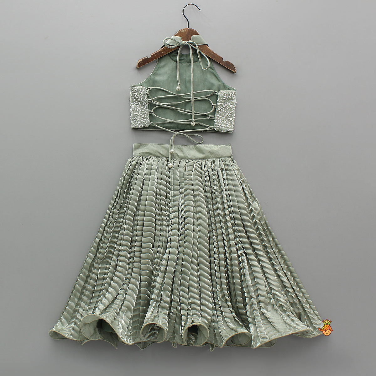 Gorgeous Open-Back Top And Crushed Lehenga with Wrist Cuff