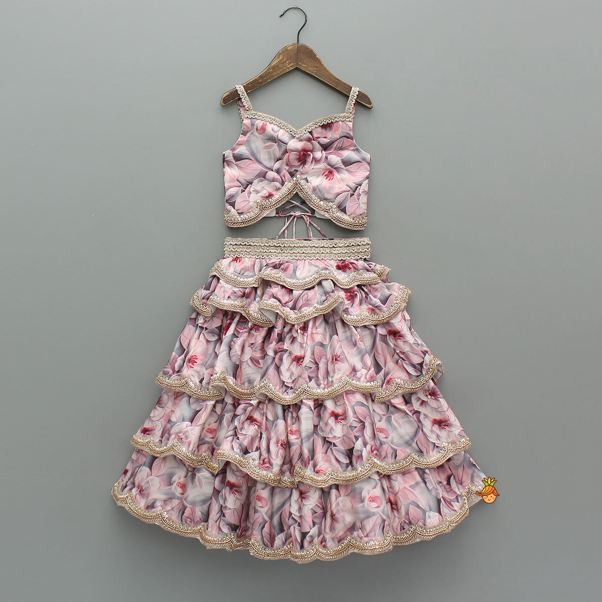 Printed Strappy Top And Graceful Layered Lehenga